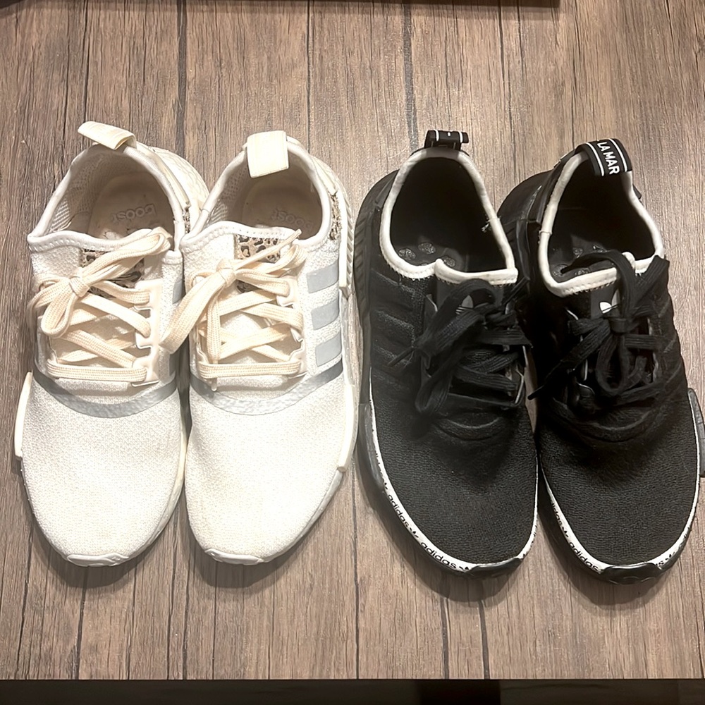 2 pair of adidas NMD sneakers